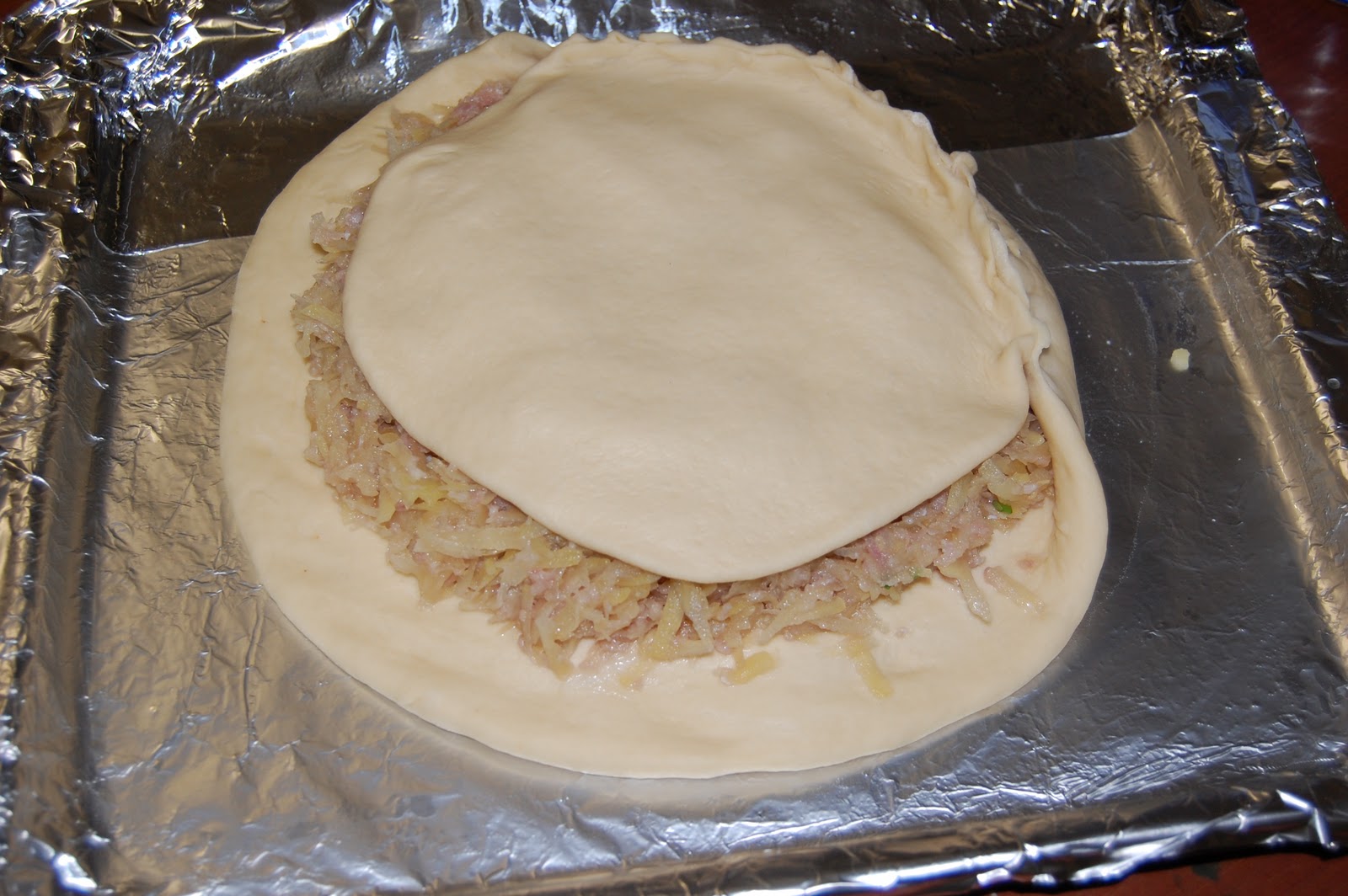 Пирог с макрурусом и картофелем