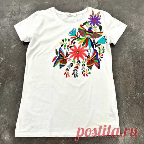Otomi T-shirt Beautiful, one of a kind, completely hand embroidered t-shirt by our Otomi artisans partners from Tenango de Doria, Hidalgo Mexico. Each t-shirt design is hand drawn by skilled Otomi artisans and later hand embroidered. The process takes about two weeks. Each T-shirt is truly unique! No other like it! Details:If you li