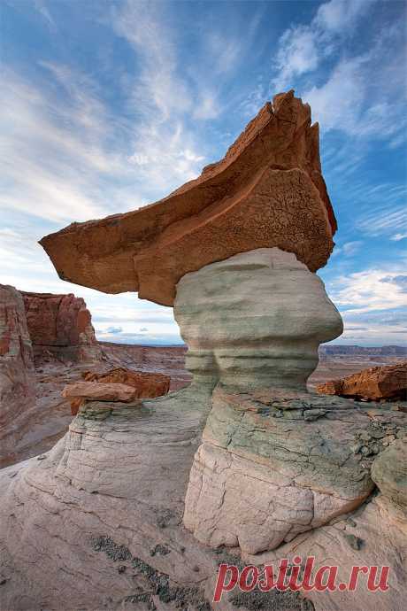 Fred Flintstone's Satellite Dish? Aperture Academy Photography Workshops  Another quick upload from the road...this was from yesterday at Stud Horse Point.  As I sat waiting for the PERFECT clouds to float by (2 hour wait) I was trying to think what this thing reminded me of...  I kept thinking it looks like a stone-age satellite dish...like something Fred Flintstone might have in his backyard so Wilma could tune in the latest episode of some stone age movie, starring Rock...