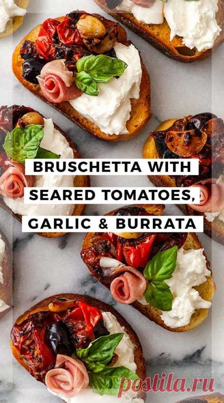 BRUSCHETTA WITH SEARED TOMATOES, ROASTED GARLIC & BURRATA