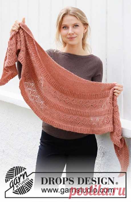 Шаль Sienna Wrap

Шаль связана ажурным узором и английской резинкой из пряжи DROPS Alpaca. Изделие вяжется сверху вниз.

-----------------------------------------------------—

Размеры:
Высота: По середине = ок. 42 см.
Длина: По верху = ок. 168 см.

Понадобится:
Пряжа DROPS ALPACA
200 г, цвет 9026, румянец

Плотность вязания:
23 петли и 30 рядов лицевой гладью или 45 рядов платочной вязкой = 10 x 10 см.
19 петель и 44 ряда английской резинкой = 10 x 10 см.

Спицы:
Круговые...