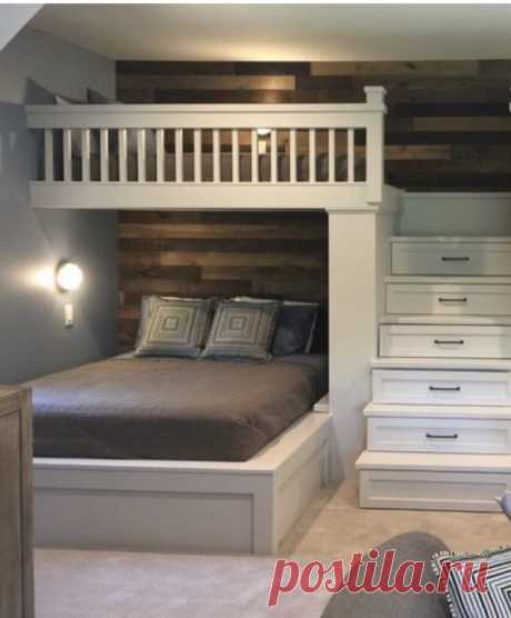 LOVE the shiplap rustic wall and the bunk storage in the stairs for the lake house. Creative use of space!