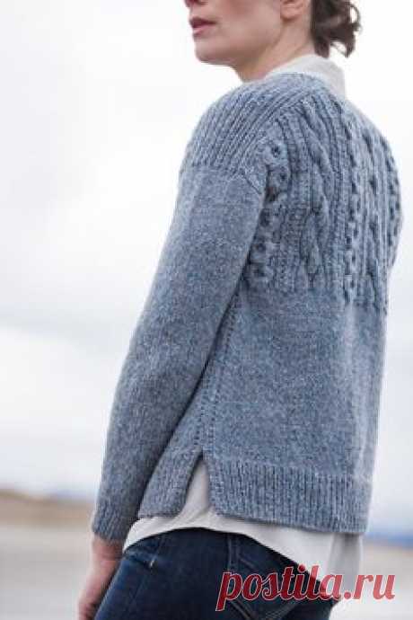 This pullover in Shelter honors every feature of the traditional gansey. Stout chain cables boldly mark the textured yoke both fore and aft. The gentlest of A-lines makes for an easy fit, and details like the split ribbed hem and decorative side seams make Caspian both eye catching and knitterly. The front and back are