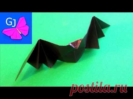 Летучая мышь оригами, хлопающая крыльями