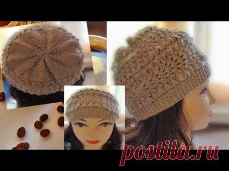 Осінньо-весняна шапочка з ажурним узором.Una gorra con un patrón calado.