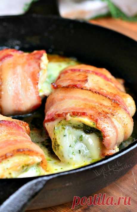 Bacon Wrapped, Mozzarella and Pesto Stuffed Chicken - Will Cook For Smiles Amazing, easy stuffed chicken dinner that'll make you lick your plate. Chicken breast stuffed with pesto and mozzarella cheese, wrapped in bacon, seared and baked. 