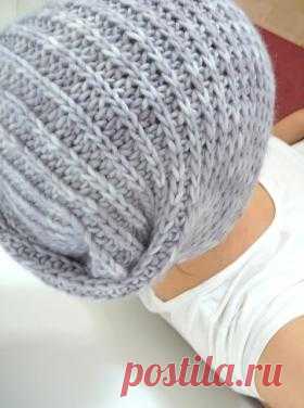 Шапка-шарф Луи Бертран Шапка-трансформер, связанная на спицах, может быть и шапкой и шарфом благодаря своей форме. Изделие вяжется полупатентной резинкой, рекомендуется...