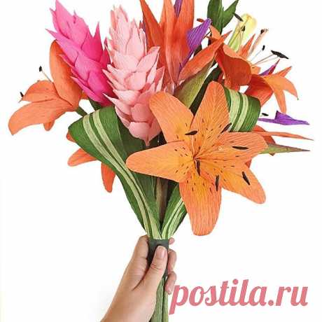 If you were wondering about whatever happened to all those tropical blooms from a few weeks ago, here's where they ended up: a gorgeous re-creation of a destination bridal bouquet! Birds of paradise, finger flowers, tiger lilies... I can almost feel the island breeze!