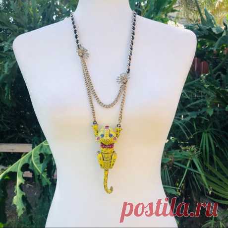 This awesome jaguar necklace is a true vintage Betsey Johnson piece. It is from the viva la Betsey necklace. Others have tried to replicate this design but nothing compares to this highly ornate stunning piece of jewelry!