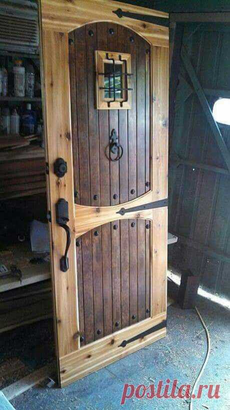 (426) Rustic wood door with rivets | gerry