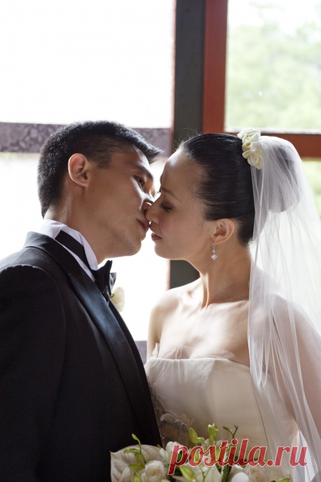Тони Люн Чу Вай с женой Кариной Лау