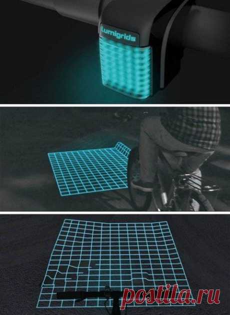 Светодиодный проектор для велосипеда, на дороге. / Занимательная реклама
