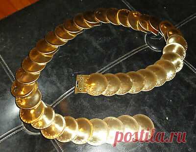 Vintage Gold Tone Coin Stretch Belt M to L 1980's metal rocker goth Renaissance  | eBay Stretch belt style with the coins secured firmly on black elastic. This is one amazingly unique Coin Belt that is a great accessory to one's outfit ! This darling and eye-catching item features Condition: Great!