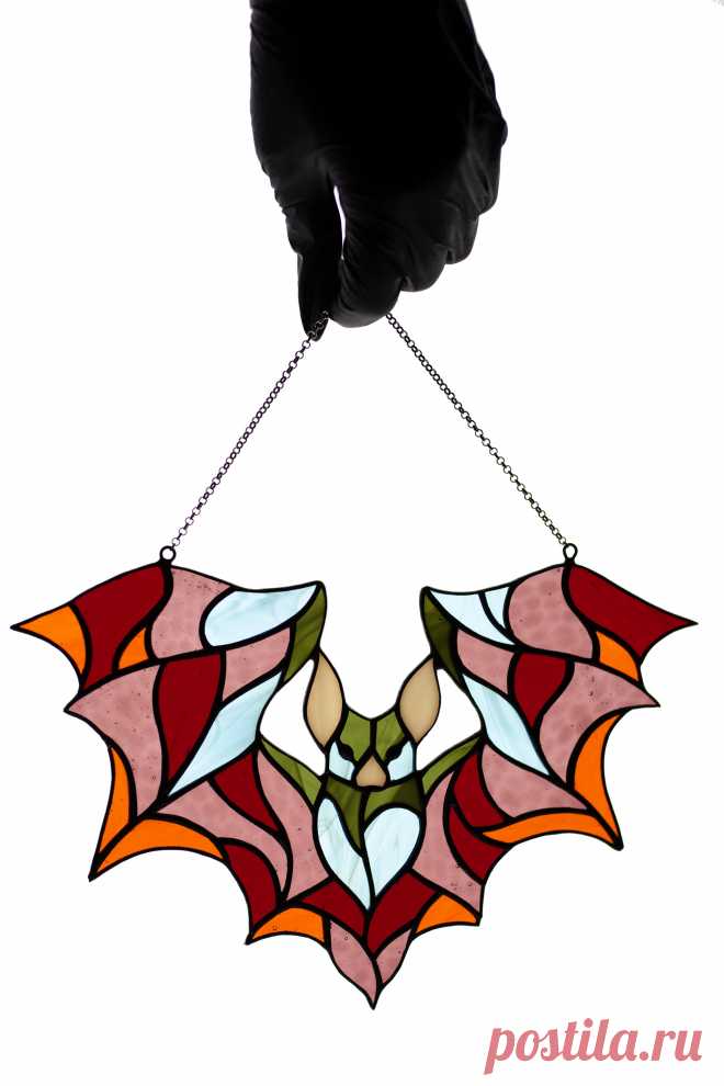 Stained glass suncatcher Bat window hanging Glass colorful bat Christm Window hanging suncatcher made of stained glass pieces by my own disign.Handmade using Tiffany copper foil technique.Looks amazing in the sunlight.You will get it completely ready for installation. It comes with a self-adhesive hook and copper chain.It will be a great gift for friends or relatives. Width: 10 inches Hei