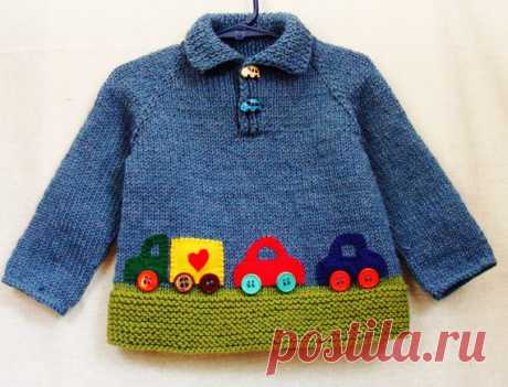 Baby Boy Sweater - 12 to 18 Month Size Wool Pullover With Colorful Cars This sweater will fit babies and toddlers 12 to 18 months old.    Hand knitted from denim blue and soft green 100% wool yarn, this polo neck pullover features car buttons, as well as appliqued truck and cars in bright primary colored felt. Would make a wonderful and unique shower or birthday gift!    Hand wash, lay flat to dry.    Sweater measures approximately 13 high, 12 across chest and 13 from neckline to cuff.