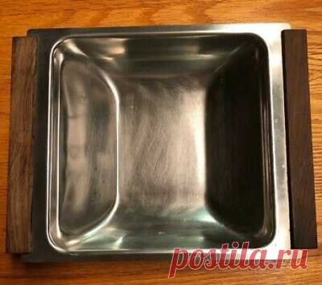 Kalmar Design Danish Serving Tray Stainless Steel w/ Wood Handles Denmark  | eBay Kalmar Design Danish Serving Tray Stainless Steel w/ Wood Handles Denmark. Condition is Used. Shipped with USPS Priority Mail.  There is some wear and scratches to the inside and the outside.  It is a great tray to have for the holidays it for daily use.  It is marked Kalmar on the back but it is faded.  See pictures. Please email with any questions.  Check out our other items also.