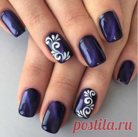 Nail Art #1771 On the large and treated by a semisquare shape nails you can apply the nail Polish of deep blue hue. This manicure itself looks luxurious, but you can further enhance the painting, having decorated the ring nails with a simple winlaton pattern. You can use white nail polish and an ordinary needle. T…
