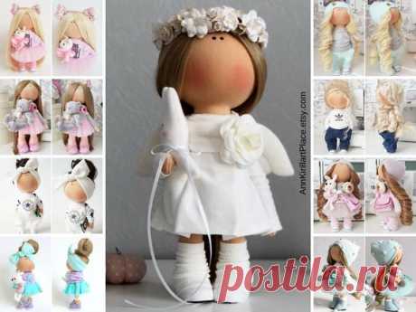 Love Angel Handmade White Tilda Doll Fabric Interior Doll | Etsy Hello, dear visitors!  This is handmade soft doll created by Master Tanya E. (Moscow, Russia). All dolls on the photo are made by master Tanya E. You can find them in our shop using masters name: https://www.etsy.com/shop/AnnKirillartPlace?search_query=Tanya+E  Doll is 30 cm (11.8 inch) tall.  Dolls