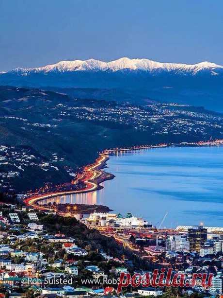 Wellington with the snow capped Tararua Ranges in the background.  |   Pinterest