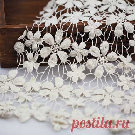 Cream Cotton Crochet Lace Fabric Floral Lace Fabric Ivory Wedding Fabric Lace 47.2" width 1 yard Width: 47.2 (120cm)  The large flower diameter: 7cm  The small flower size is 4.5cm  Thickness: thin  1meter=1.09Yard 1 yard=91.4cm 1=2.54cm  This can be applide to wedding dress,party dresses,girls skirt,scarf,DIY homemade fabric,or any other crafts you like.Summer is coming,it is the best