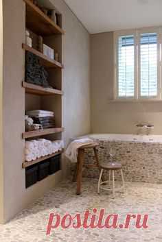Sliced Java Tan pebble tile floor and tub surround. Nice…