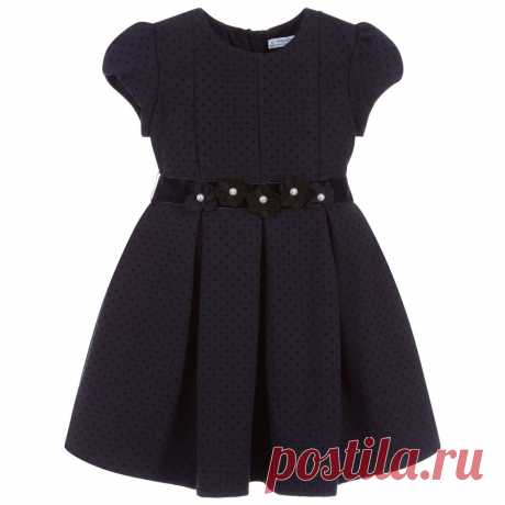 Girls Navy Blue Cotton Dress Girls navy blue dress from Mayoral, with a raised black dot pattern. It is made in soft, mid-weight cotton jersey and has lovely puffed sleeves. There is a removable velvet ribbon belt, with fabric flowers and pearl beads. 
