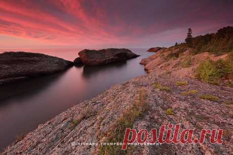 Titanic: Lake Superior July 2016 Twilight gleams over titanic rock formations sheltering the boreal shoreland of Lake Superior.  Copyright © 2016 Richard Thompson.  Notes: I spent two evenings here waiting for the right circumstances to unfold this July. It seems I seldom encounter the sort of conditions I desire the first time around and, consequently, find myself months and years down the road returning to my favorite places to try and capture some semblance of what I had originally imagined.