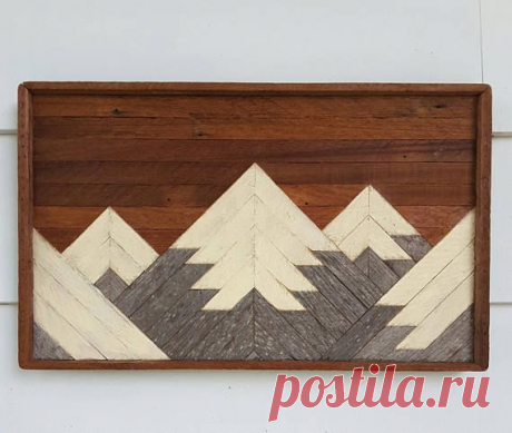 Handmade wooden wall art and mountain decor. This mountain range wall decor, of rustic, geometric and mosaic design, has 5 mountain peaks in a 20 wide by 12 inch tall space. From smooth textured reclaimed wood lath and weathered barn wood, each a one of a kind piece. It would make