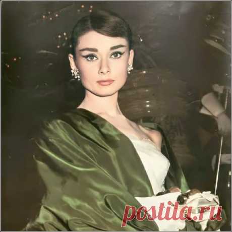 Publicity shot of Audrey Hepburn for the film "Funny Face", by Bud Fraker at Opéra Garnier, Paris, September 9, 1956 Audrey's wardrobe was designed by Givenchy.