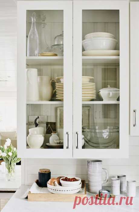 (40) classic white glassfront cabinets show off collections in the kitchen | relaxed ranch house tour on coco kelley | Chez Moi