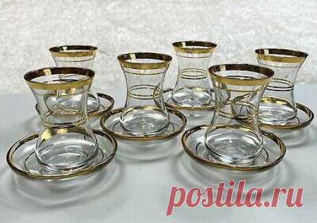 Vintage Mid Century Turkish PASABAHCE Gold Trim Tea Glass Set of 6 with Saucers   | eBay These glasses and saucers are in very good condition. The second to the last photo shows the worst of it. The saucer have a P on the bottom. The glasses are marked too, see photo.