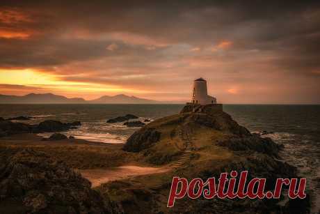 Llanddwyn Island, Anglesey, Wales by Karl Dyson This shot came after a good soaking from a different vantage point on Llanddwyn Island. The tide was in and the waves were strong so I headed up to the edge of the cliffs and started to take a series of images as the sky started to light up from the cloudy sunrise. Time and Read More   lp-mag.com/a65dv