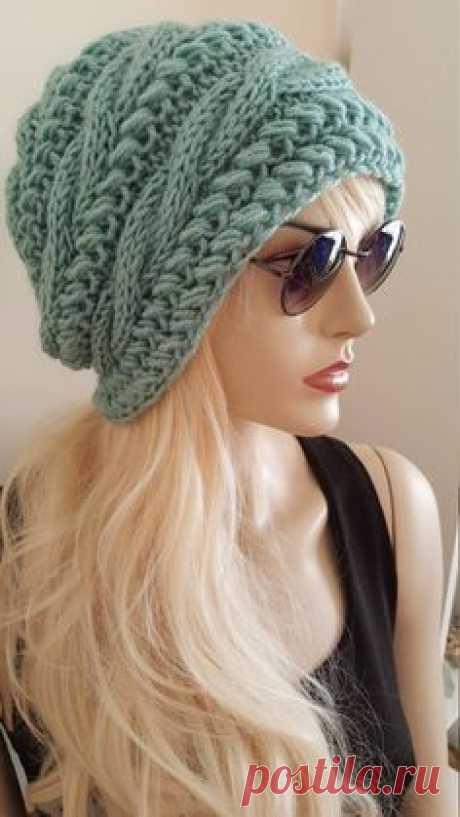 100% 75 Acryl 100% 25 Wool   Great for any hair style, color, type or head size.   One size fits most...from teens to women.( 21 inches - 23 inches ) Women hat.   Hand wash in cold water and lay flat to dry. Reshape if necessary.  for matching scarf and cowl please click the link