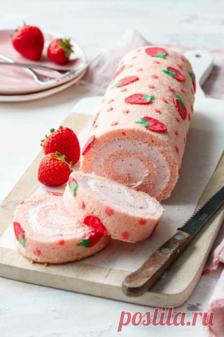 Strawberry Cake Roll | Love and Olive Oil Roll into strawberry season with this gorgeous strawberry cake roll: a delicate almond sponge cake decorated with a cute strawberry design and filled with strawberry whipped cream. The Japanese are