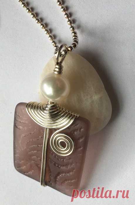 Light burgundy plum (or you might say mauve, rosy brown, smokey wine) colored, one-of-a-kind pendant, created with hand cut and polished patterned stained glass. Sterling silver wire is tightly and elegantly wrapped around this beautifully textured swirl imbedded translucent glass and a high quality