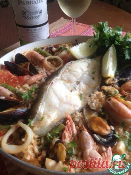 Паэлья с зубаткой и морепродуктами – кулинарный рецепт