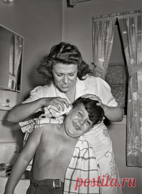 Can You Hear Me Now? June 1942. "Brooklyn, New York. Red Hook housing project. Mrs. Caputo washes son Jimmy's ears. He is recovering from infantile paralysis." Photo by Arthur Rothstein.