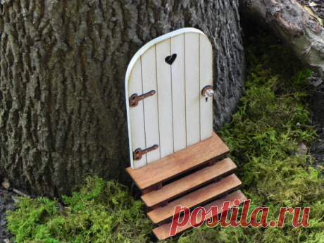 Fairy Door fairy garden miniature accessories hand crafted  wood cloud white with brown hinges handmade stairs Bring some magic into your home or garden by adding an enchanted fairy door. This delightful little fairy door has been handmade with great care and attention from a variety of different woods and designed to enchant and captivate the imagination of the young and young at heart.  Once your fairy door is in place the fairies will soon find it, but remember, only th...