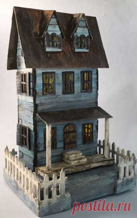 This is my most recent cardboard house - the Sea-worn Beach House. The goals with this little house were to make a wraparound porch, add the siding BEFORE cutting out the windows and doors, add