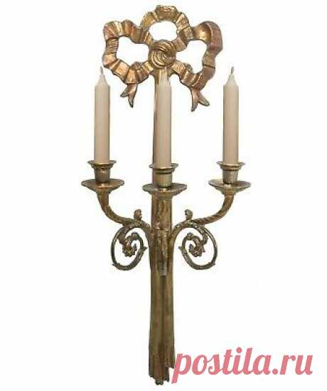 EARLY 20TH C ANTIQUE LG ORNATE BRASS WALL SCONCE, W/RIBBON/SCROLLED 3-ARM DESIGN  | eBay This isn't a shy piece that would humbly sit on a narrow wall in a hallway or foyer, taught to behave itself. It's big, bad and beautiful. A welded, wall-hanging plate is located on the back for sturdy, firm hanging on a wall fastener.