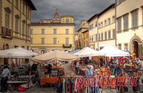 Antiques market in the medieval walled town of Arezzo, Italy   |  Pinterest