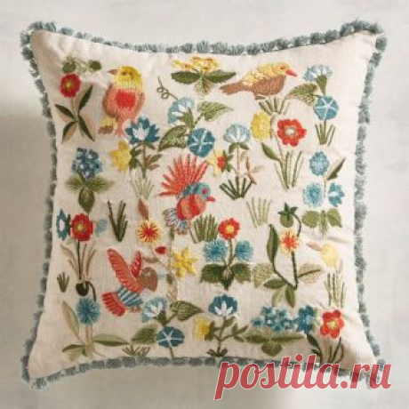 Embroidered Floral Birds Mini Pillow Plant a secret garden on your sofa. Our pillow features colorful birds and blooms on a neutral background with light blue fringe trim.