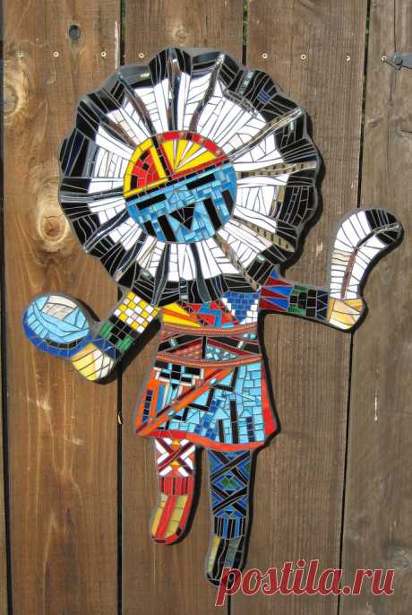 Sunface Kachina This is a commissioned piece depicting a Sunface Kachina. It's a Hopi image meant to bring warmth, playfulness for the young, shelter for the old, and a bright future. This will be living in a garden in Arizona. 24" x 36".