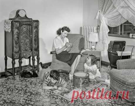 Family Room: 1942 June 1942. "Brooklyn, New York. Red Hook housing development. Mrs. Caputo and her children in the living room of their four-and-a-half room apartment for which they pay $5.35 weekly." Acetate negative by Arthur Rothstein for the Office of War Information.