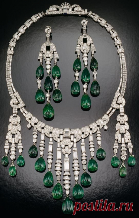 Emerald and diamond necklace - Designed by Ostertag; set with carved emeralds and diamonds in platinum; circa 1930. The longest dangle on the necklace and the earrings are each about 3 1/2 inches long.