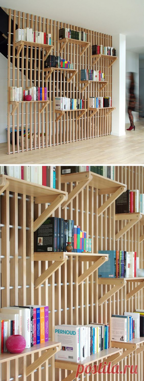 (198) This Custom Designed Shelf System Is Used To Store Books And Act As A Guard Rail For The Staircase