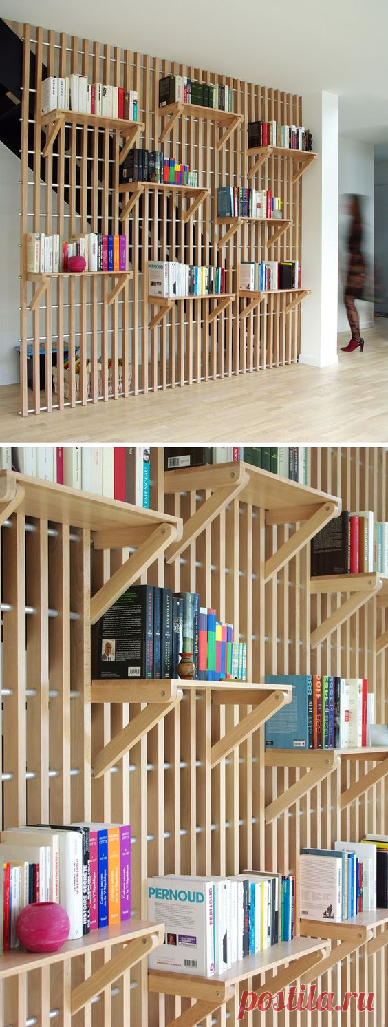 (198) This Custom Designed Shelf System Is Used To Store Books And Act As A Guard Rail For The Staircase