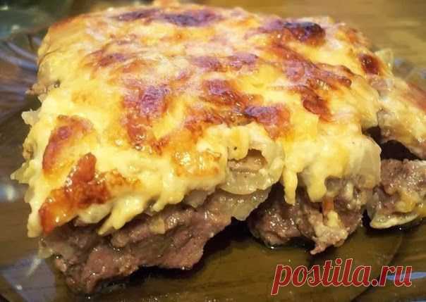 Говядина по-купечески с сыром и грибами.
