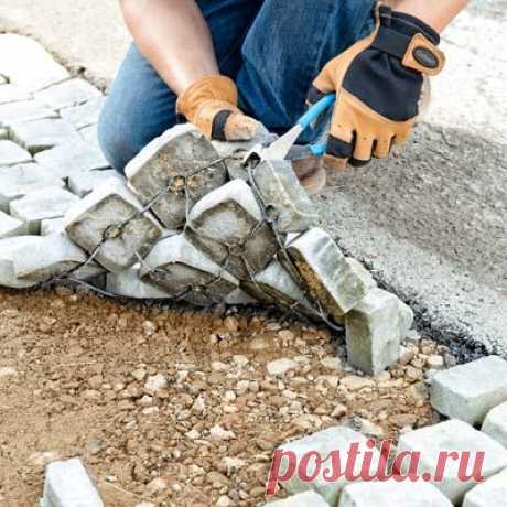 Use handy paver mats made of concrete cobblestones to give your driveway some old-world charm.