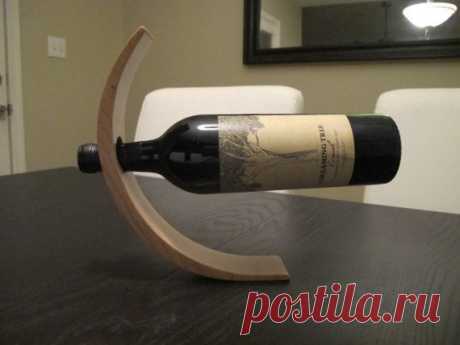 Stunning balancing wine bottle holder by HoffmasterWoodworks